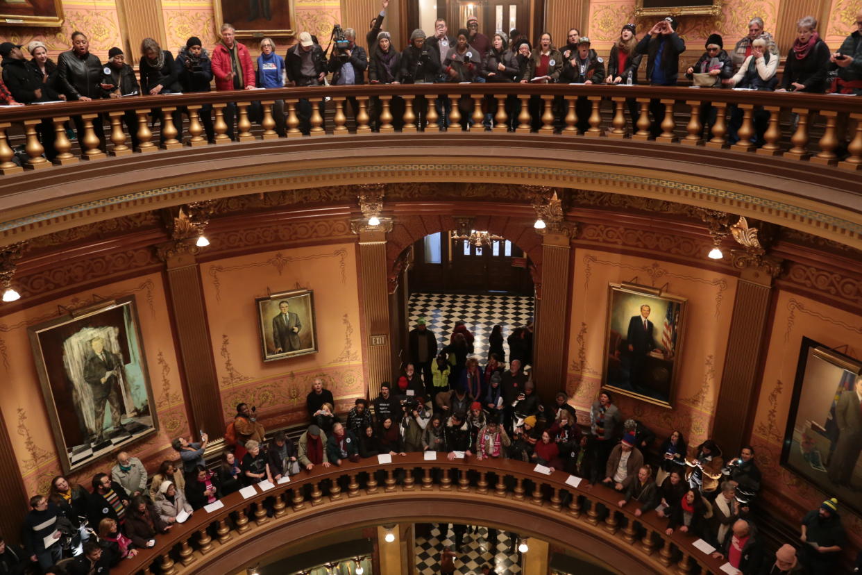 Protesters gather in the Michigan Capitol's rotunda. (Photo: Progress Michigan)