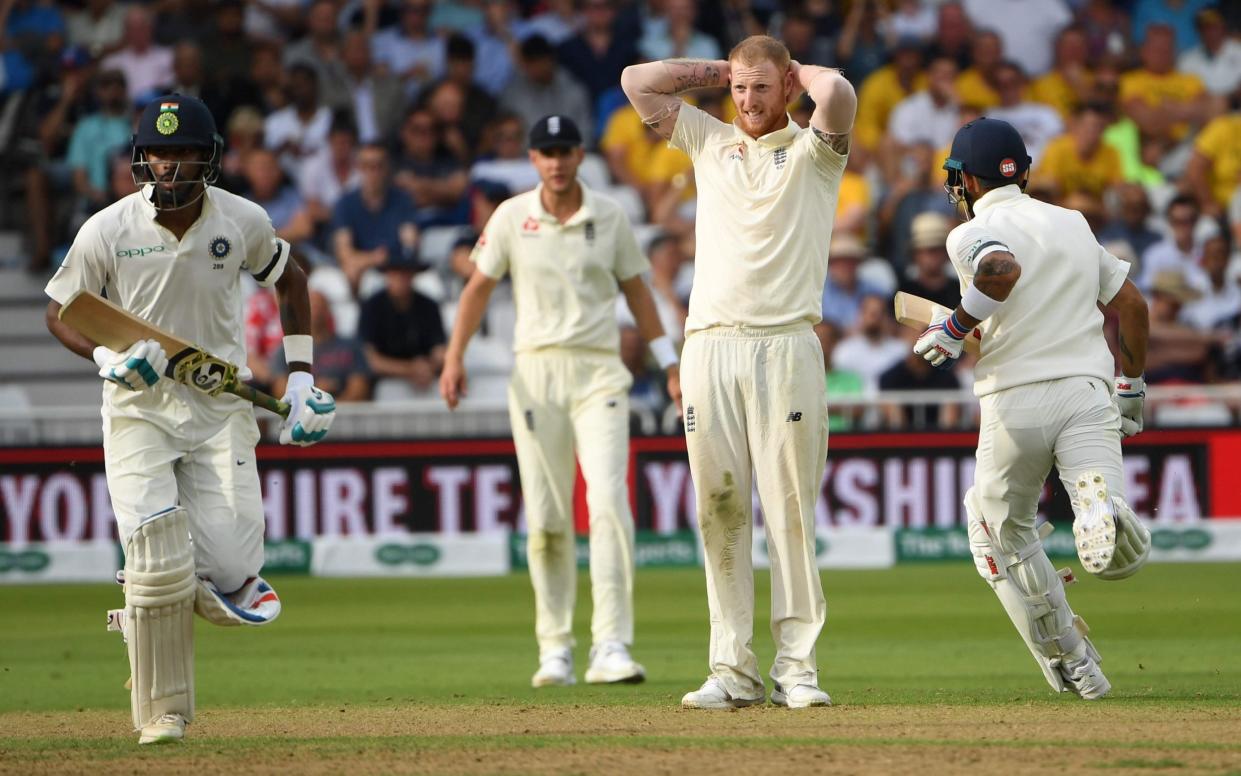 Virat Kohli (right) and Hardik Pandya plunder runs off Ben Stokes - AFP