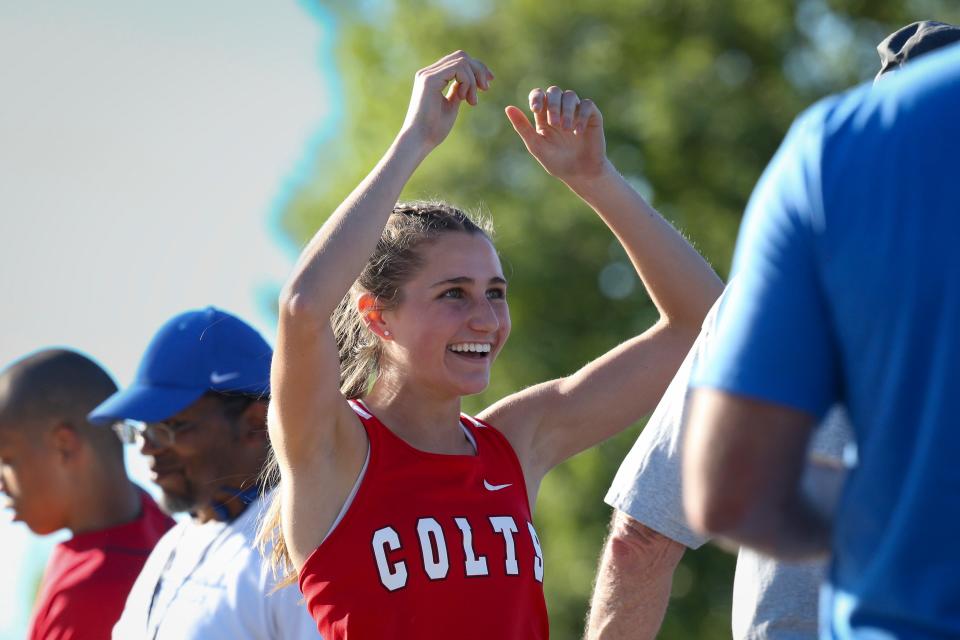 Thurston’s Breanna Raven celebrates a personal best 19 foot, 6 inch long jump at the OSAA Class 5A Midwestern League district meet at Springfield High School Thursday, May 18, 2023.