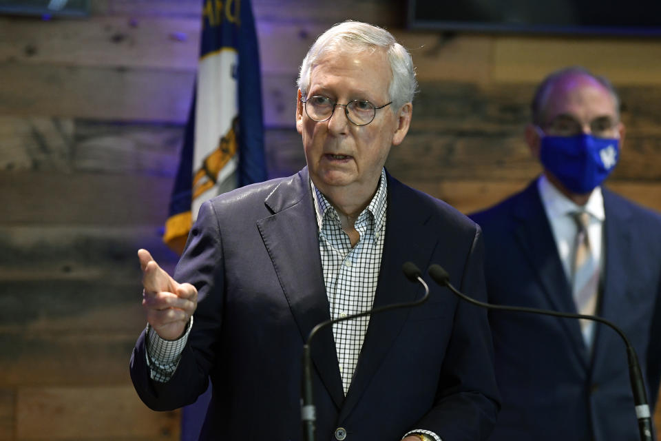 Senate Minority Leader Mitch McConnell, R-Ky., speaks during a news conference at Kroger Field in Lexington, Ky., Monday, April 5, 2021. (AP Photo/Timothy D. Easley)