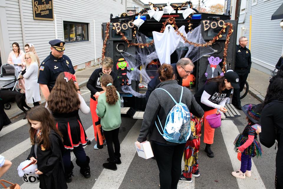 Plymouth police decorated their emergency response vehicle and handed out candy during last year's Halloween on Main Street event in Plymouth.