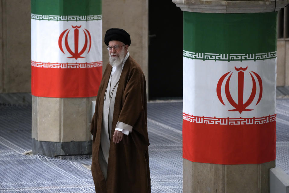 Iranian Supreme Leader Ayatollah Ali Khamenei arrives to vote for the parliamentary runoff elections, in Tehran, Iran, Friday, May 10, 2024. (AP Photo/Vahid Salemi)