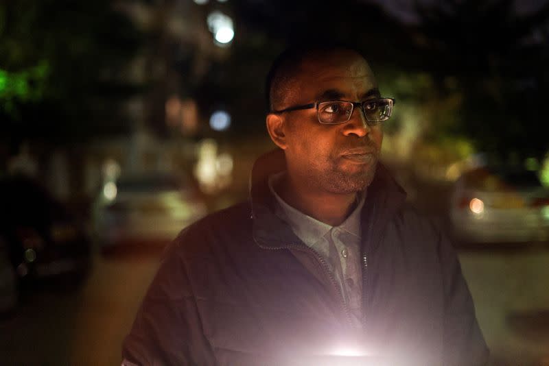 Ilan Mengistu delivers a statement to the media after Palestinian Islamist militant group Hamas released a video showing what they claim is his brother Avera Mengistu, outside the family home in Ashkelon