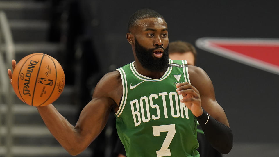 Jaylen Brown looks to pass against the Toronto Raptors during their game on Monday.