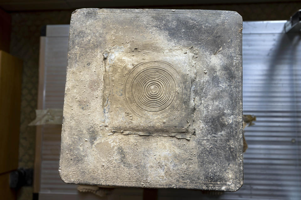 This photo provided by the U.S. Military Academy at West Point, shows a time capsule uncovered, Friday, June 9, 2023. The long-forgotten time capsule, a small lead box measuring about a cubic foot, was discovered in May 2023, during restoration to a monument honoring Revolutionary War hero Thaddeus Kosciuszko, on the grounds of West Point, in New York. The box will be opened during a livestreamed event, Monday, Aug. 28. (Christopher Hennen/U.S. Army via AP)