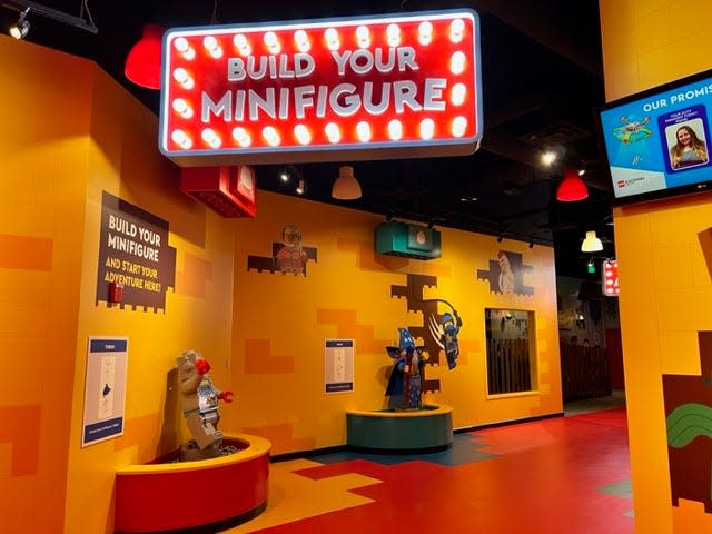Immediately upon entering, guests are invited to build personal minifigures that they can take with them on each activity. They just can't take them home.