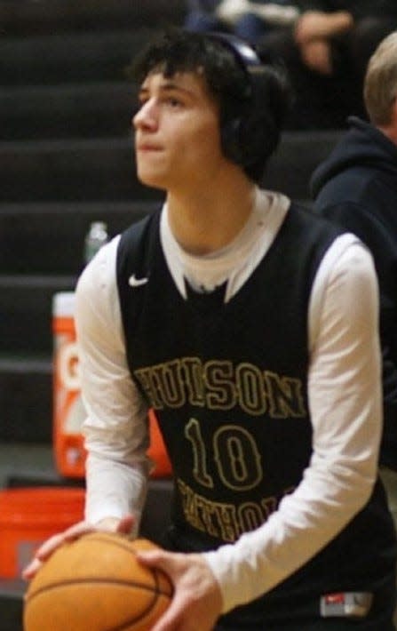 Point Boro senior guard Shane Ryan wears a replica Hudson Catholic No. 10 jersey, which his father, Mike wore as a player, during warmups prior to the Panthers' games this season.