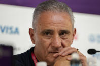 Brazil's head coach Tite listens to a question during a press conference on the eve of the World Cup quarter final soccer match between Brazil and Croatia in Doha, Qatar, Thursday, Dec. 8, 2022. (AP Photo/Andre Penner)