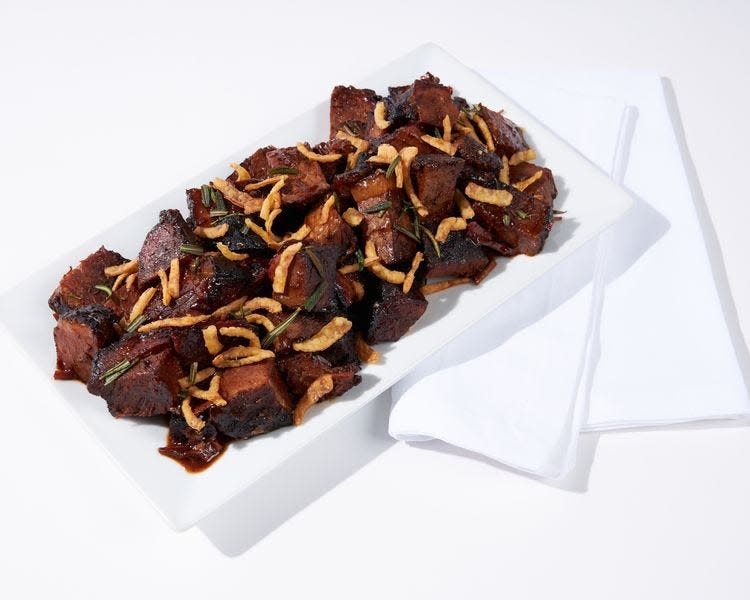 The official Kentucky Derby 150 on-track food menu includes bourbon cherry brisket burnt ends.