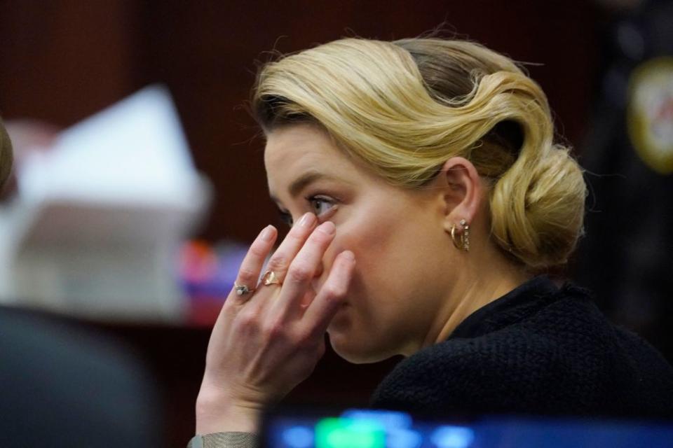 Actor Amber Heard listens in the courtroom at the Fairfax County Circuit Courthouse in Fairfax, Virginia, April 25, 2022.<span class="copyright">Steve Helber—Getty Images</span>