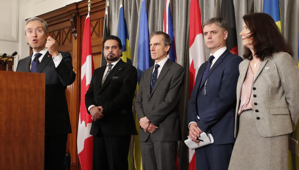 Francois-Philippe Champagne, Canada Minister of Foreign Affairs, from left, Afghanistan Minister of Foreign Affairs Idrees Zaman, British MP Andrew Murrison, Ukraine's Minister of Foreign Affairs Vadym Prystaiko and Sweden's Minister for Foreign Affairs Ann Linde listen during a press conference after a meeting of the International Coordination and Response Group for the families of the victims of PS752 flight that crashed shortly after taking off from the Iranian capital Tehran on Jan. 8, killing all 176 passengers and crew on board.(AP Photo/Frank Augstein)