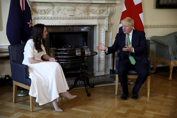 British Prime Minister Boris Johnson, right, attends a meeting with New Zealand Prime Minister Jacinda Ardern at Downing Street, in London, Friday July 1, 2022. (John Sibley/Pool Photo via AP)