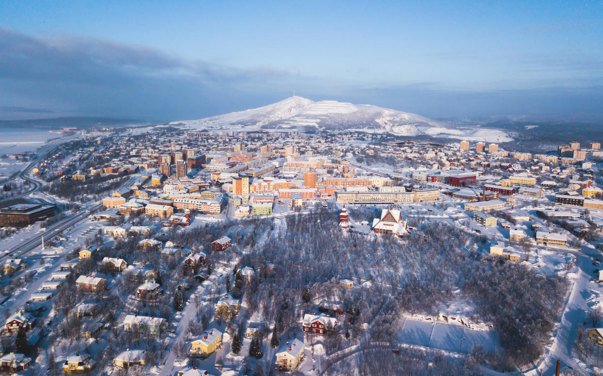 Kiruna, in northern Sweden, is being moved because it's threatened by iron ore mining deep beneath the city. (Photo: Nikolay Tsuguliev via Getty Images)