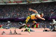 South Africa's double amputee athlete Oscar Pistorius takes the start of the men's 400m heats at the athletics event during the London 2012 Olympic Games