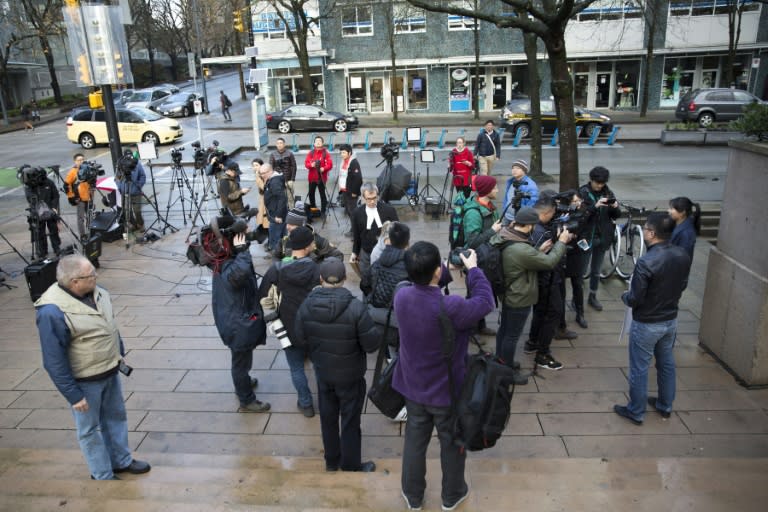 Media gather outside the bail hearing of Huawei's Chief Financial Officer Meng Wanzhou