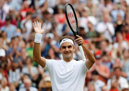 Tennis - Wimbledon - London, Britain - July 6, 2017 Switzerland’s Roger Federer celebrates winning the second round match against Serbia’s Dusan Lajovic REUTERS/Stefan Wermuth