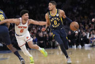 Indiana Pacers guard Tyrese Haliburton (0) drives against New York Knicks guard Quentin Grimes (6) in the first half of an NBA basketball game, Wednesday, Jan. 11, 2023, at Madison Square Garden in New York. (AP Photo/Mary Altaffer)