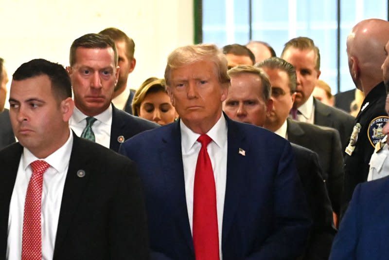 Former President Donald Trump leaves the courtroom in his civil fraud trial at State Supreme Court on Thursday in New York City. Photo by Louis Lanzano /UPI