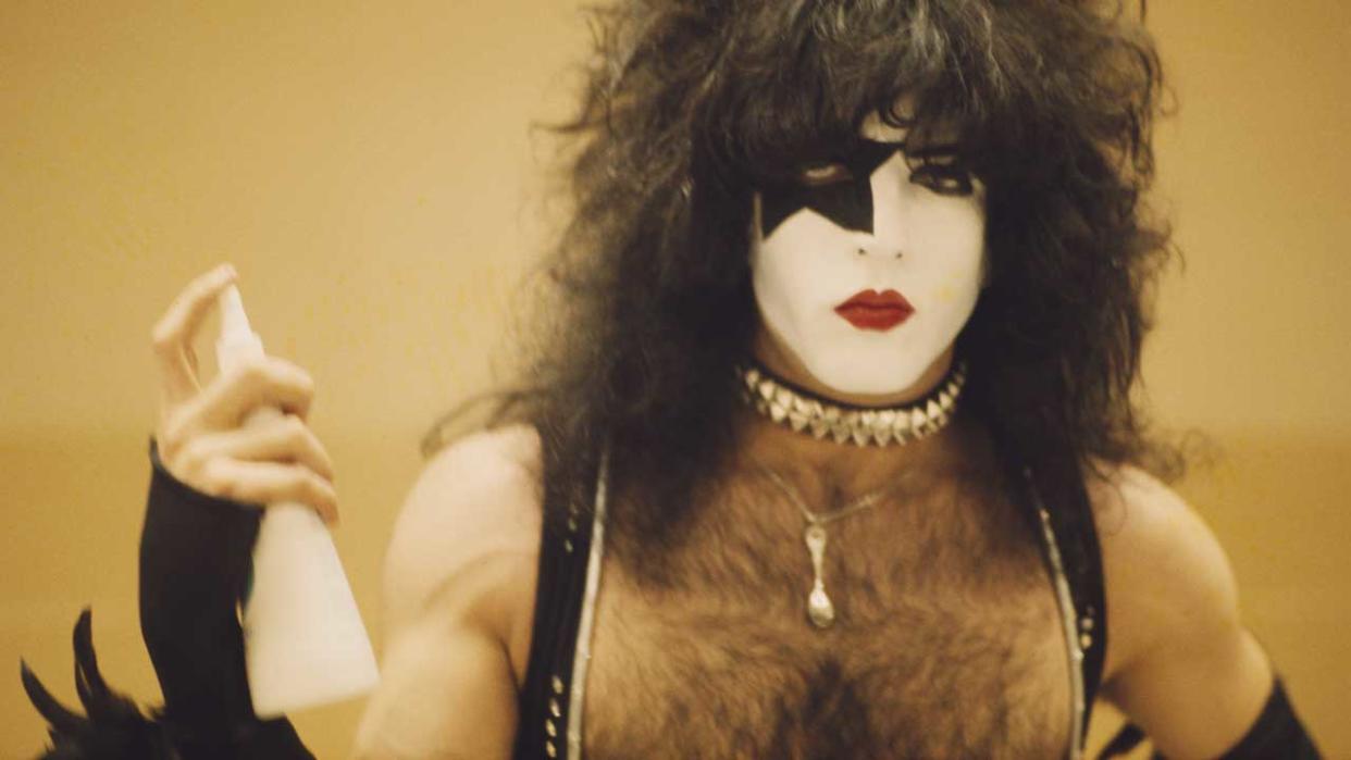  Paul Stanley with a bottle of hairspray, 1977. 