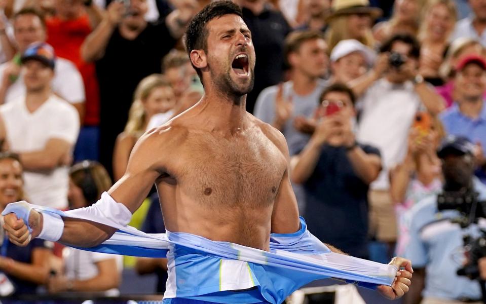 Novak Djokovic rips his shirt in celebration after his epic win over Carlos Alcaraz