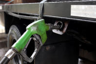 A fuel nozzle is seen at a gas station of the Venezuelan state-owned oil company PDVSA in Caracas, Venezuela September 24, 2018. REUTERS/Marco Bello