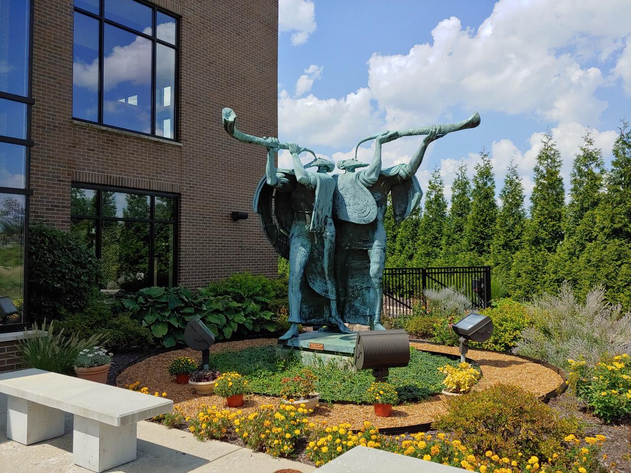 The statue of two rabbis blowing shofar horns has become a symbol of Rockdale Temple in Amberley Village. Rockdale Temple is celebrating its 200th anniversary in 2024.