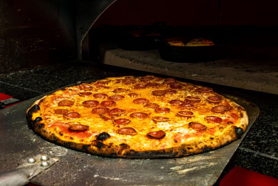 Fresh from the coal-fired oven, a pepperoni pie at Bucks Coal Fired Pizza in North Palm Beach.