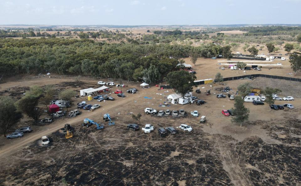 An aerial picture shows the site of the attack on a music festival by Hamas militants near Kibbutz Re'im in the Negev desert in southern Israel on October 10, 2023. / Credit: Jack Guez/AFP via Getty Images