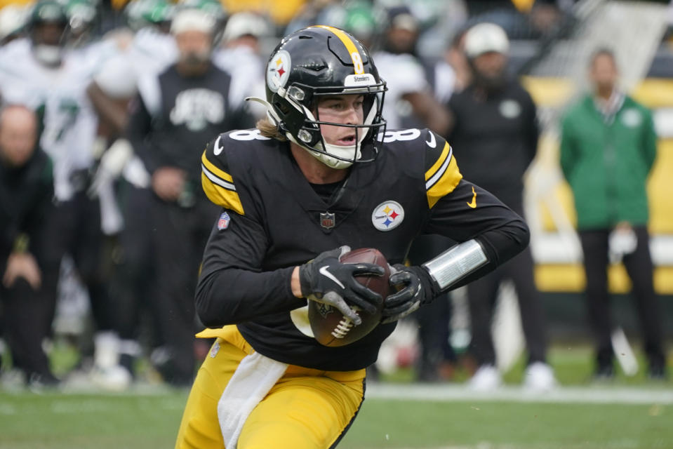 Pittsburgh Steelers quarterback Kenny Pickett (8) scrambles against the New York Jets during the second half of an NFL football game, Sunday, Oct. 2, 2022, in Pittsburgh. (AP Photo/Gene J. Puskar)