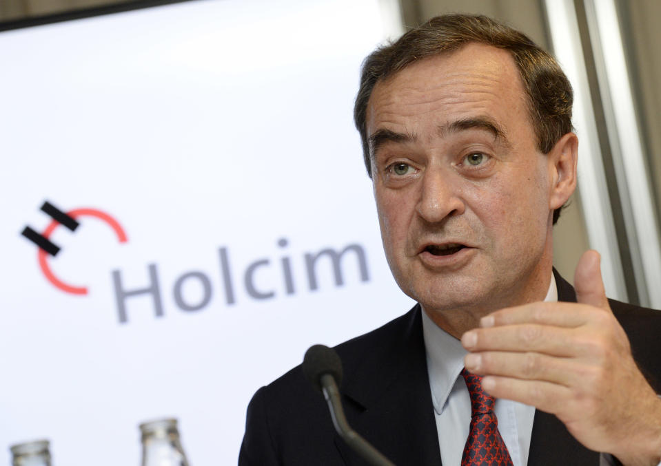 Bruno Lafont, future chairman of LafargeHolcim speaks at a news conference in Zurich, Switzerland, Monday, April 7, 2014. Swiss-based Holcim and its French counterpart, Lafarge, two of the world's largest suppliers of building materials announced plans for a "merger of equals" Monday that would create an industry giant with a combined 32 billion euros (US dollar 44 billion) in annual revenues. (AP Photo/Keystone, Steffen Schmidt)