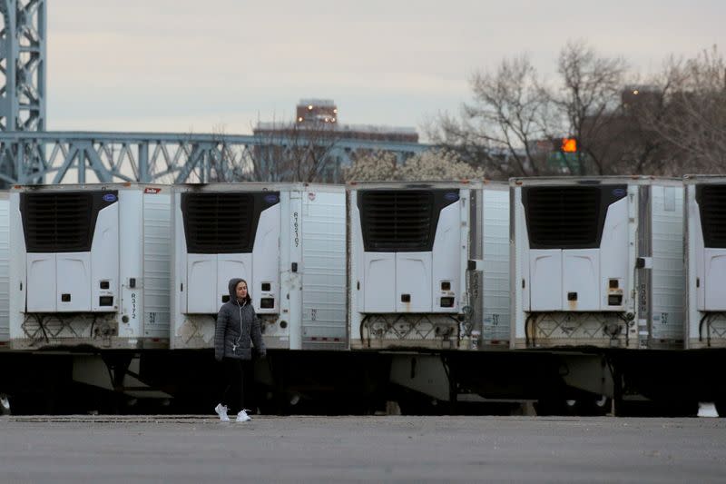 FILE PHOTO: Refrigerated tractor trailers that can be used by hospitals for makeshift morgues are seen, during the coronavirus disease (COVID-19) outbreak, in Icahn Stadium parking lot on Randall's Island in New York