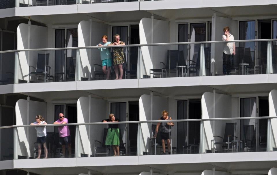 People on cruise ship balconies