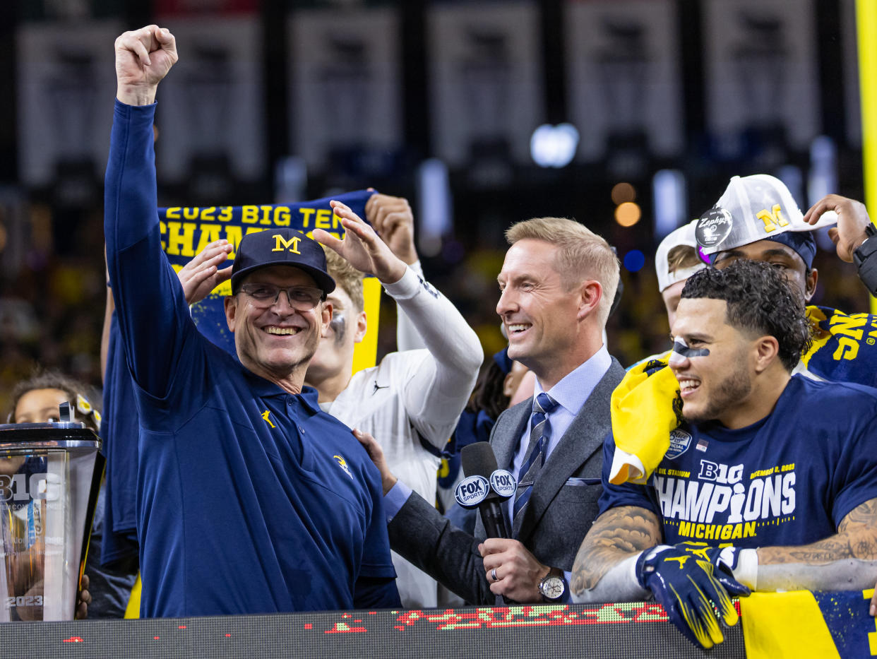 INDIANAPOLIS, INDIANA - DECEMBER 2: Head coach Jim Harbaugh of the Michigan Wolverines celebrates after the winning the Big Ten Championship against the Iowa Hawkeyes at Lucas Oil Stadium on December 2, 2023 in Indianapolis, Indiana. (Photo by Michael Hickey/Getty Images)
