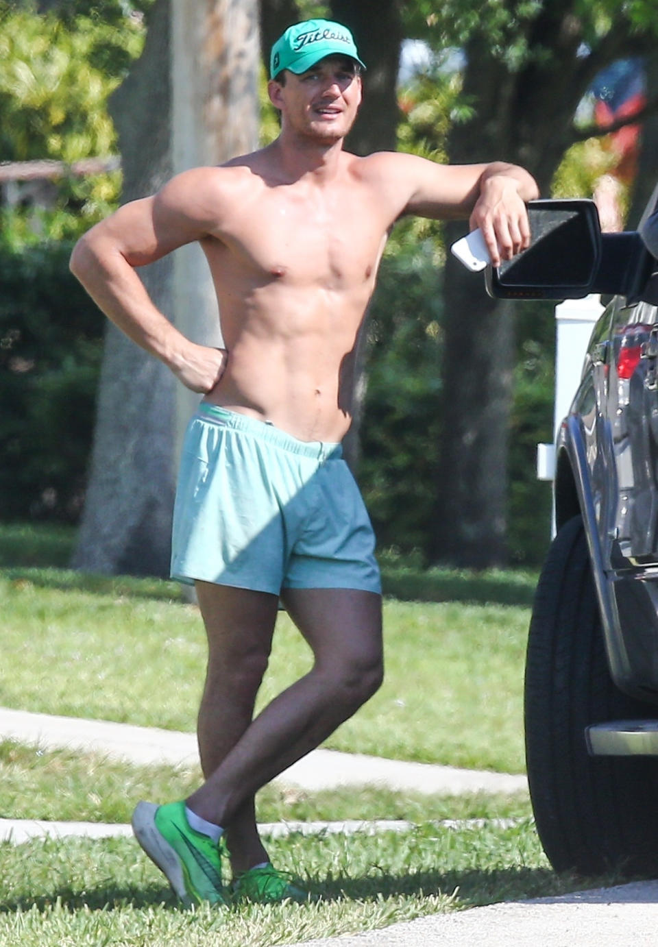 <p>A shirtless Tyler Cameron takes a break on Thursday while out for a jog in Palm Beach, Florida.</p>