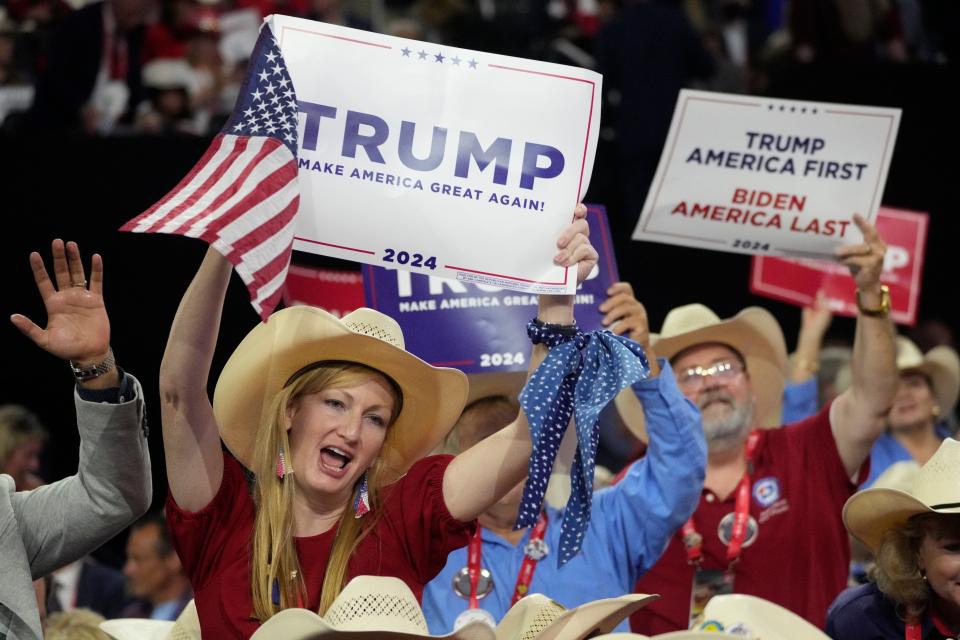 Delegates from Texas celebrate during the second day of the Republican National Convention at the Fiserv Forum. The second day of the RNC focused on crime and border policies.
