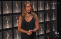 In this video grab captured on Sept. 20, 2020, courtesy of the Academy of Television Arts & Sciences and ABC Entertainment, Jennifer Aniston presents the award for outstanding lead actress in a comedy series during the 72nd Emmy Awards broadcast. (The Television Academy and ABC Entertainment via AP)