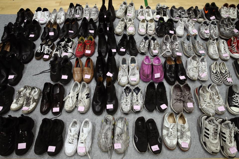 The belongings of victims of the deadly Halloween celebration stampede are shown at a gym on 1 November 2022 in Seoul, South Korea (Getty Images)