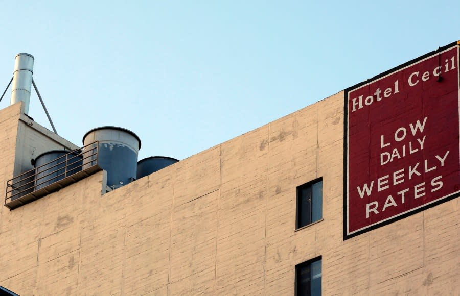 Water tanks seen on the roof of the Hotel Cecil in a Wednesday Feb. 20,2013 file photo. Police say the body of a missing Canadian woman was found Tuesday at the bottom of one of four cisterns on the roof of the hotel. The tanks provide water for hotel taps and would have been used by guests for washing and drinking. Los Angeles County Department of Public Health officials were expected to release the results of tests on the water on Thursday, Feb. 21. Investigators used body markings to identify 21-year-old Elisa Lam, police spokeswoman Officer Diana Figueroa said late Tuesday. (AP Photo/Nick Ut, File)