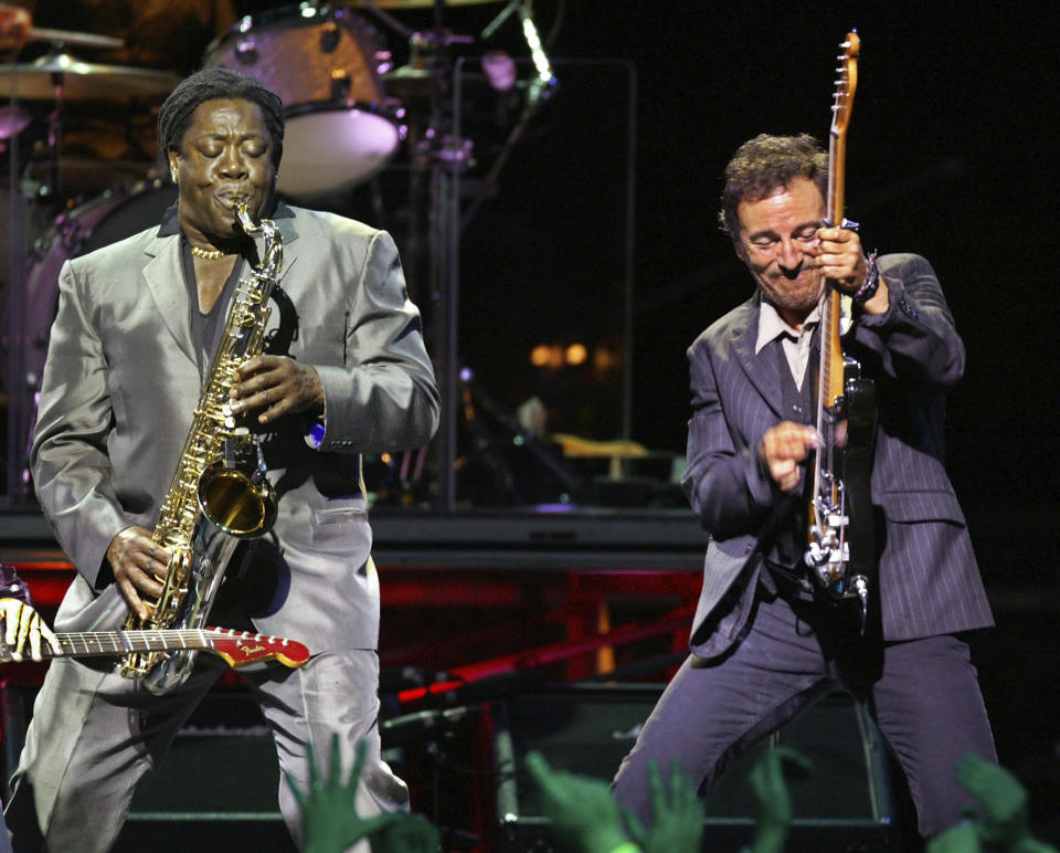 FILE - Bruce Springsteen, right, performs with E Street Band sax player Clarence Clemons during their show in Boston on Oct. 4, 2002. Springsteen's latest album, "Letter To You" will be released on Oct. 23. (AP Photo/Winslow Townson, File)