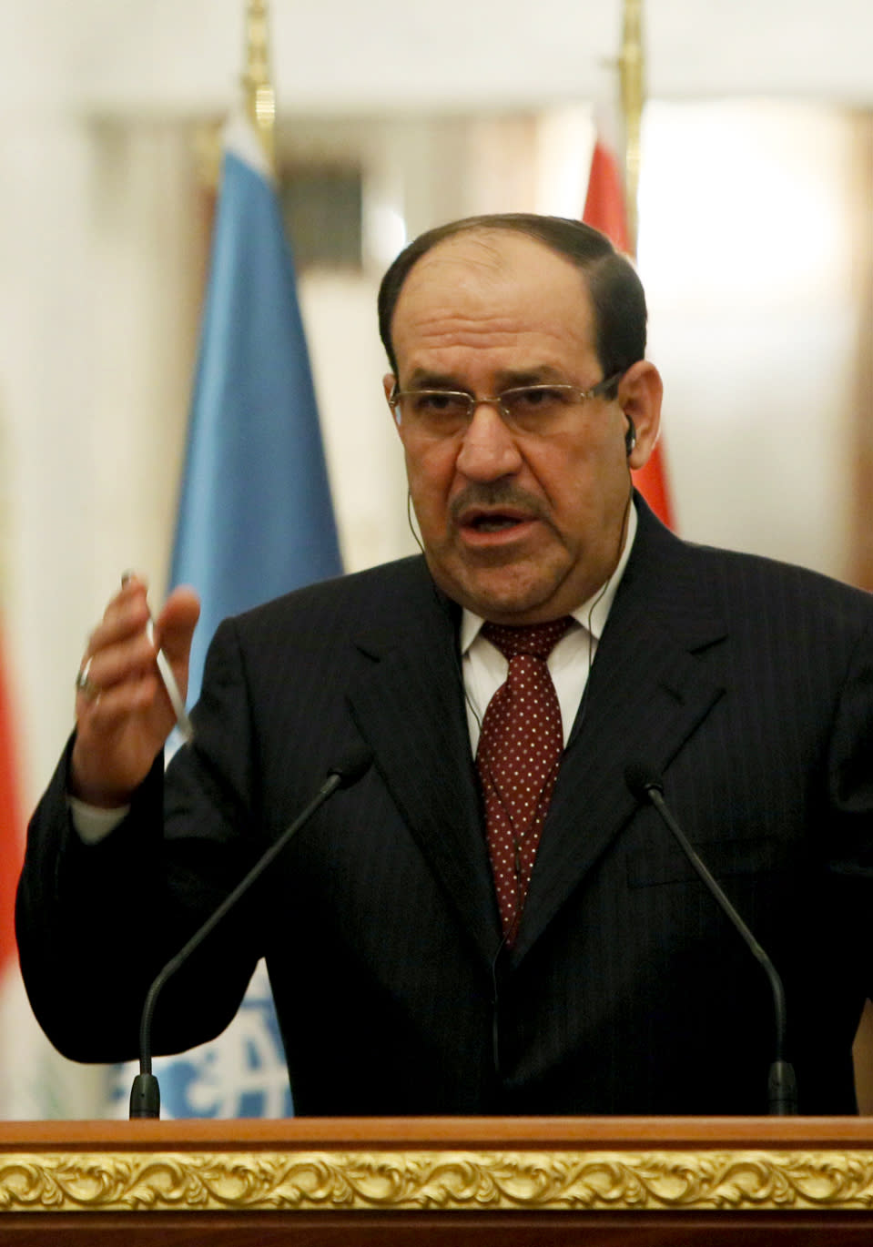 Iraqi Prime Minister Nouri al-Maliki gives a joint press conference with United Nations Secretary-General Ban Ki-Moon during Ki-moon's two day visit to Baghdad, Iraq, Jan. 13, 2014. The U.N. chief expressed deep concerns Monday over the deteriorating security situation in Iraq as an unprecedented standoff is underway between Iraqi troops and al-Qaida-linked militants in western Anbar province. Ki-moon made his comments during a joint a press conference with the Iraqi Prime Minister, Nouri al-Mailiki. (AP Photo/Ali Al-Saadi, Pool)
