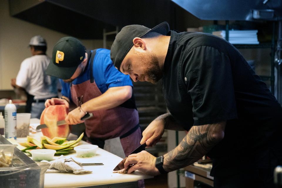 Chefs Bob Boye, right, and Rich Boye, left, prepare for dinner on Wednesday, Aug. 24, 2022, at Liberty in Fort Myers.