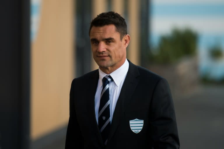 New Zealand fly-half Dan Carter arrives for a press conference at the Racing Metro 92 training centre after signing a three-year deal with the French rugby union team, on November 27, 2015