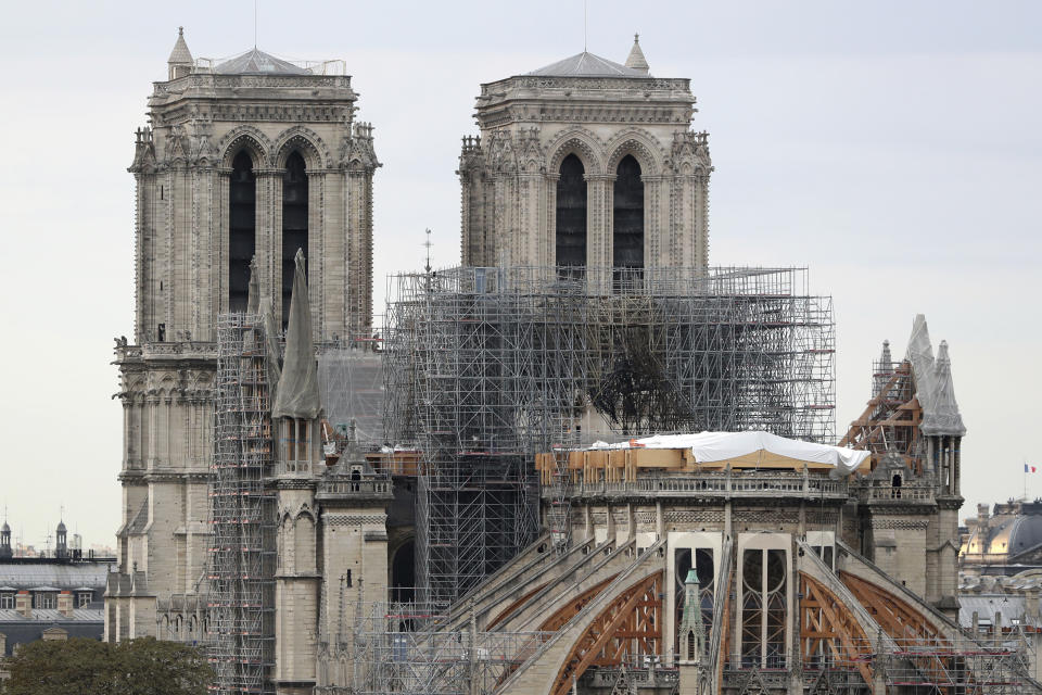 FILE - In this Monday, Sept. 9, 2019 file photo, the Notre Dame cathedral is pictured in Paris. General Jean-Louis Georgelin who is to oversee reconstruction of Notre Dame Cathedral, devastated by fire in April, got a public reprimand for advising the chief architect for France’s historic monuments to “shut his mouth.” (AP Photo/Thibault Camus, File)
