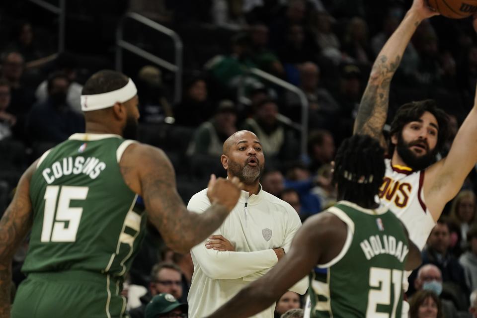 Cleveland Cavaliers head coach J. B. Bickerstaff reacts during the first half of an NBA basketball game against the Cleveland Cavaliers Monday, Dec. 6, 2021, in Milwaukee. (AP Photo/Morry Gash)