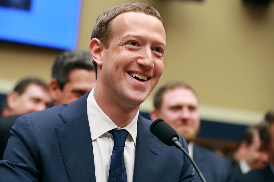 WASHINGTON, DC - APRIL 11: Facebook co-founder, Chairman and CEO Mark Zuckerberg smiles at the conclusion of his testimony before the House Energy and Commerce Committee in the Rayburn House Office Building on Capitol Hill April 11, 2018 in Washington, DC. This is the second day of testimony before Congress by Zuckerberg, 33, after it was reported that 87 million Facebook users had their personal information harvested by Cambridge Analytica, a British political consulting firm linked to the Trump campaign. (Photo by Chip Somodevilla/Getty Images)