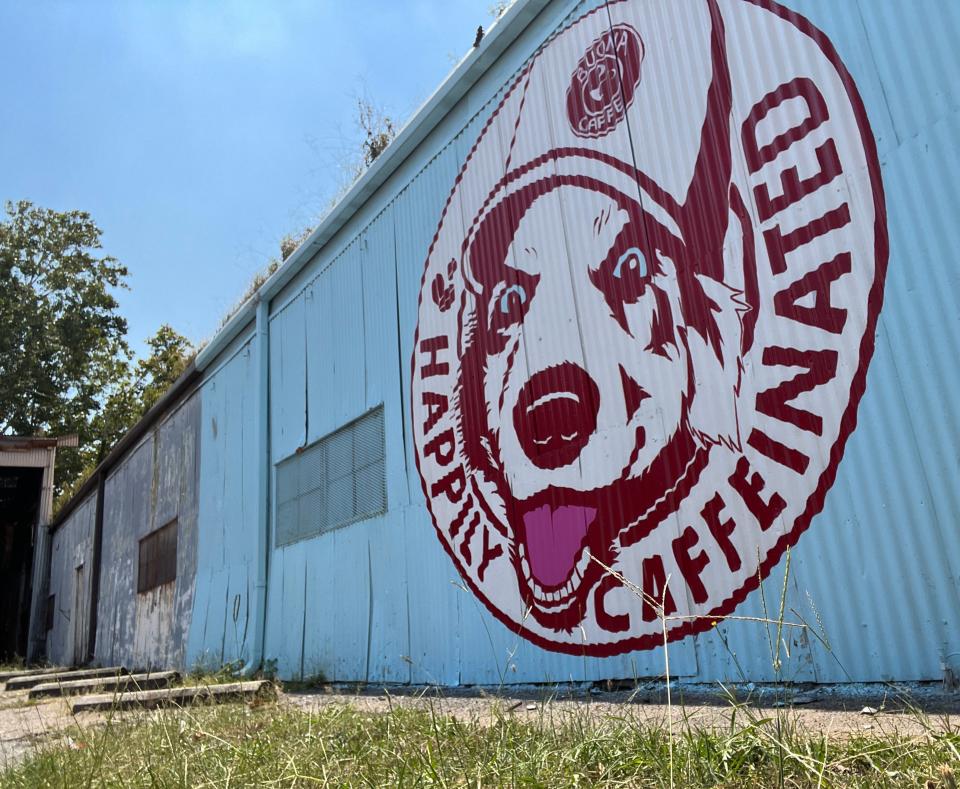 Addison Niday's "Happily Caffeinated" mural outside Buona Caffe on Reynolds Street in downtown Augusta on Sunday, Aug. 20, 2023.