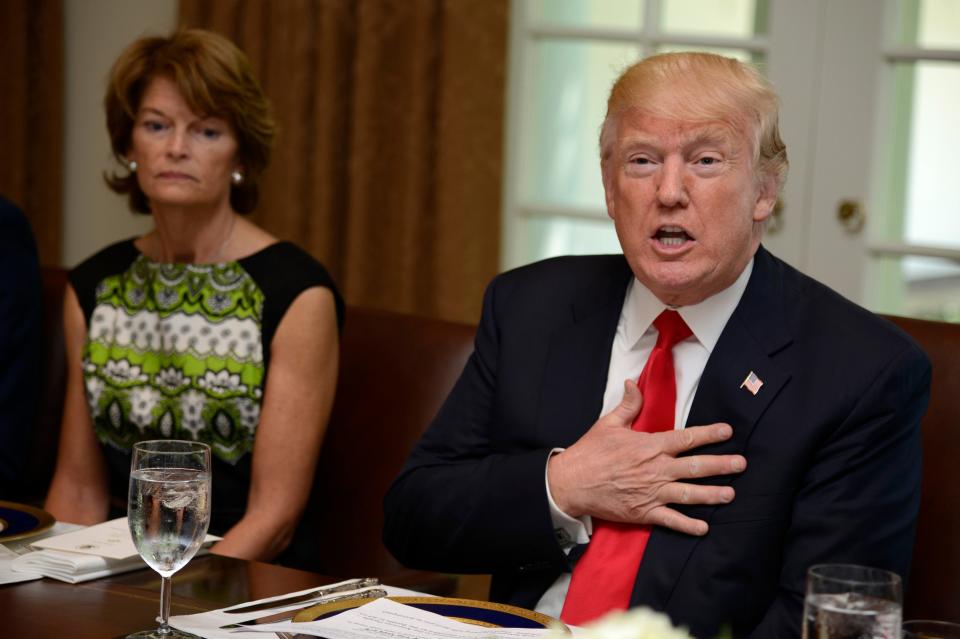 President Donald Trump hosts a working lunch with members of Congress, including Alaska Sen. Lisa Murkowski (L) at the White House, June 13, 2017, in Washington, DC. (Getty Images)