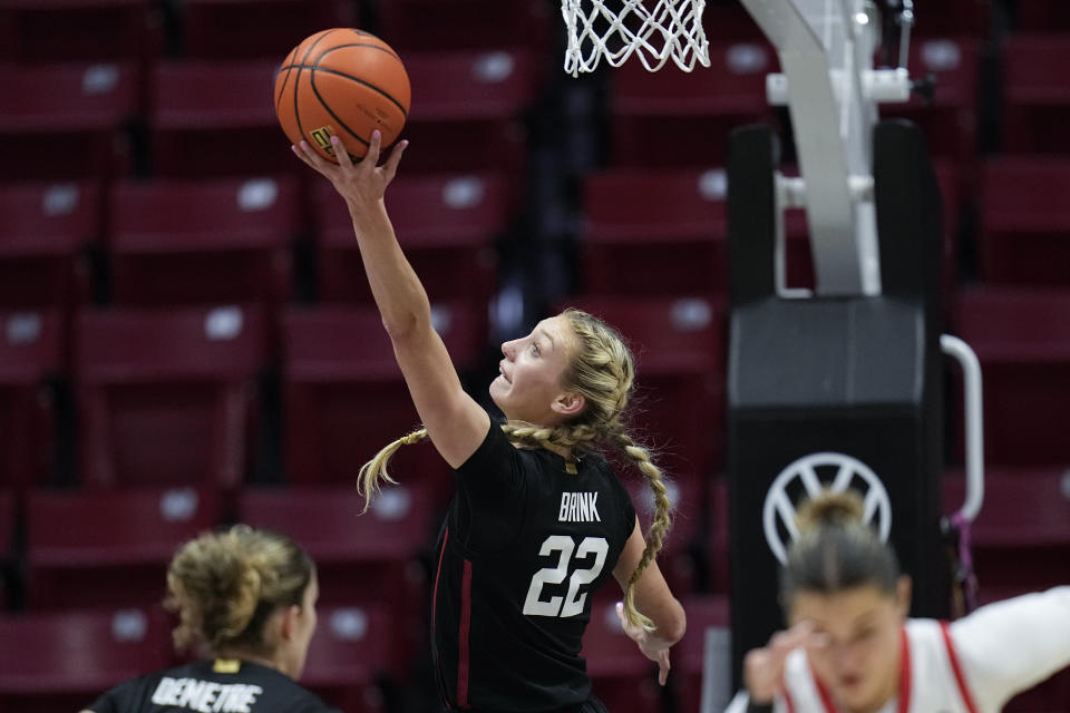 Stanford forward Cameron Brink grabs a defensive rebound during the first half of an NCAA college basketball game against San Diego State, Friday, Dec. 1, 2023, in San Diego. (AP Photo/Gregory Bull)