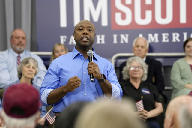 U.S. Sen. Tim Scott, R-S.C., speaks at a town hall, Sunday, April 30, 2023, in Charleston, S.C. Scott has launched an exploratory committee and says he'll announce a decision on the 2024 presidential race by the end of May. (AP Photo/Meg Kinnard)