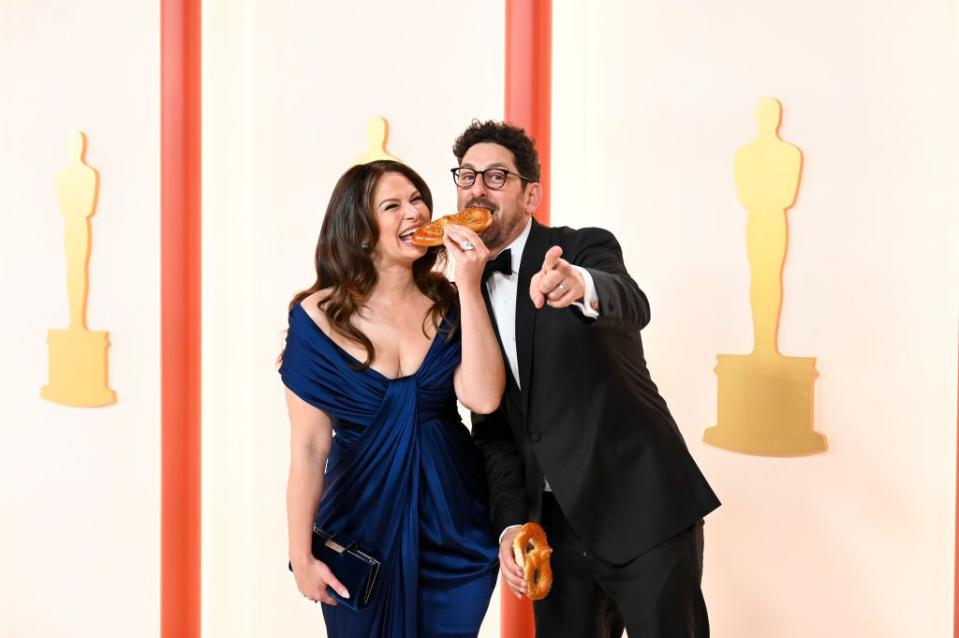 Katie Lowes and Adam Shapiro arrive at the 95th Annual Academy Awards.